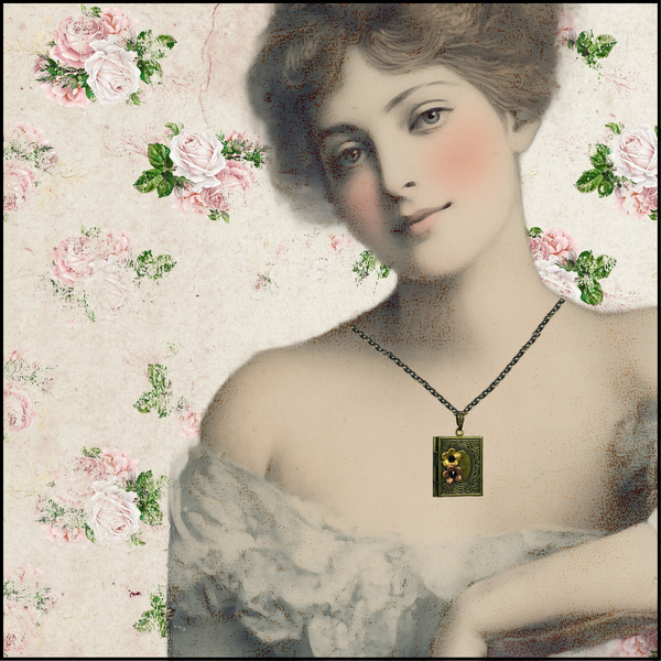 Vintage-style portrait of a woman wearing a rectangular pendant necklace with a dark green frame and a small painted figure, set against a floral pink rose patterned background.