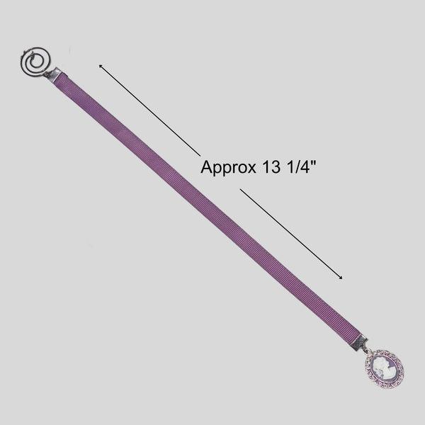 Purple ribbon bookmark with spiral paper clip and cameo charm, shown with measurement indicating approximately 13 1/4 inches length, elegant vintage reading accessory