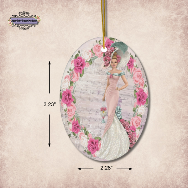 Measurements of an oval Oval ceramic ornament with Edwardian Lady with large hat music sheet background surrounded with pink and white roses.  3.23" x 2.28"
