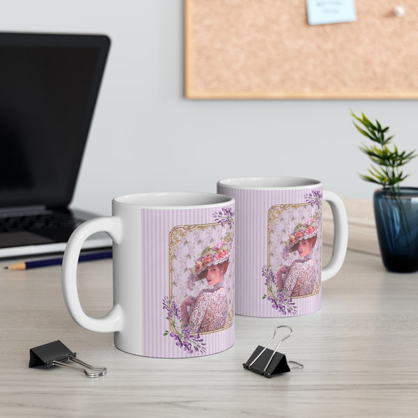 front and back of Ceramic Mug with Elegant Early 1900s Vintage Woman wearing  a Purple Lace Dress, Large Floral Hat Purple on Striped Background and White Handle