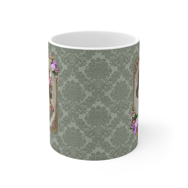 side view of mug with green damask design