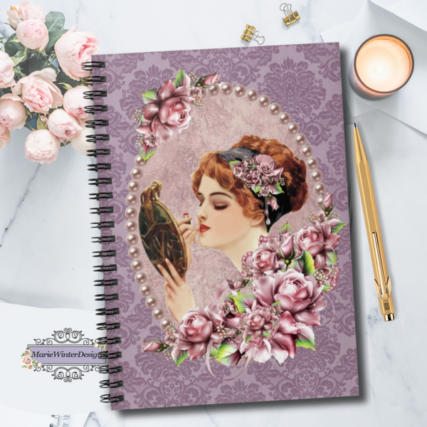 Spiral Bound Notebook Journal  With Elegant Early 1900s Vintage Harrison Fisher Illustration surrounded with lavender pearls, Accented With  Purple Flowers on purple damask background with candle, gold pen and pink roses behind