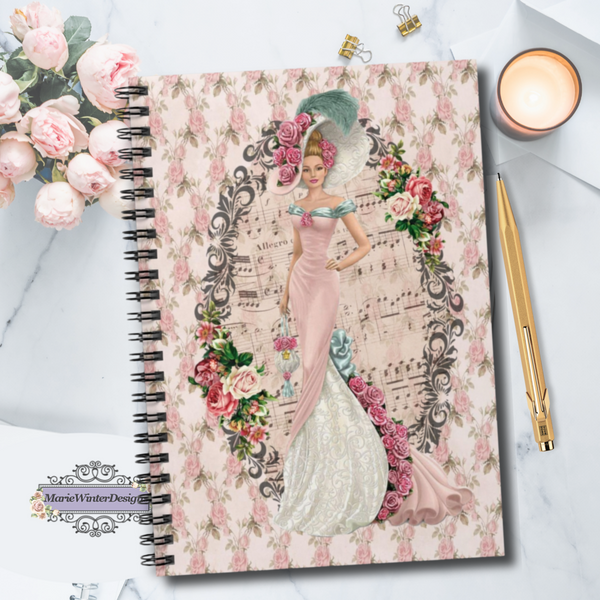 Spiral Bound Notebook Journal  with Early 1900s Vintage Hello Dolly Lady in a Pink Dress and Large Hat on Floral Background decorated with clusters of vintage flowers with candle, pen and pink roses behind