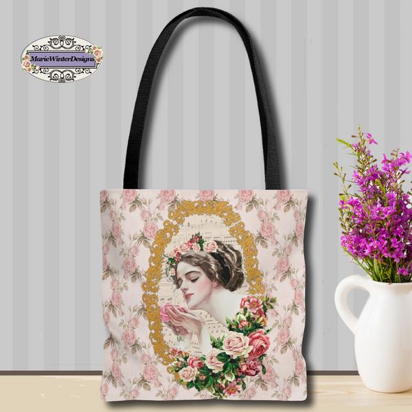 Tote Bag Purse With Elegant Early 1900s Vintage Harrison Fisher Illustration with gold frame on pink roses with green leaves over white background against a gray stripe backdrop with white vase and small purple flowers